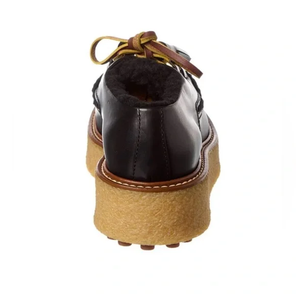 Tod’s Leather and Shearling Platform Loafer - Picture 3 of 11